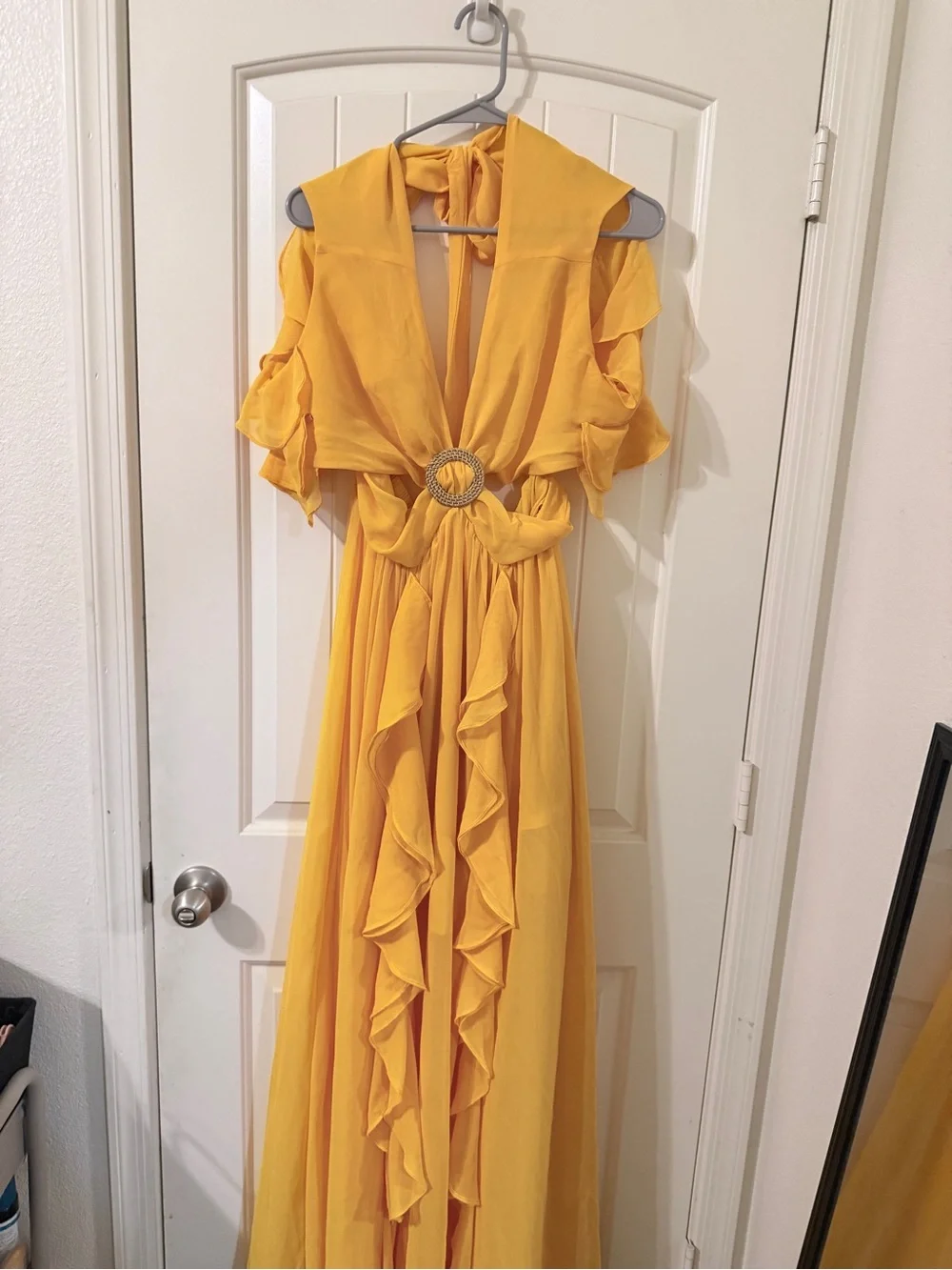 Sleeveless Ruffle Cutout Maxi Dress in Mustard “Carlita Ruffle Cutout
Maxi Dress - Picture 2 of 7